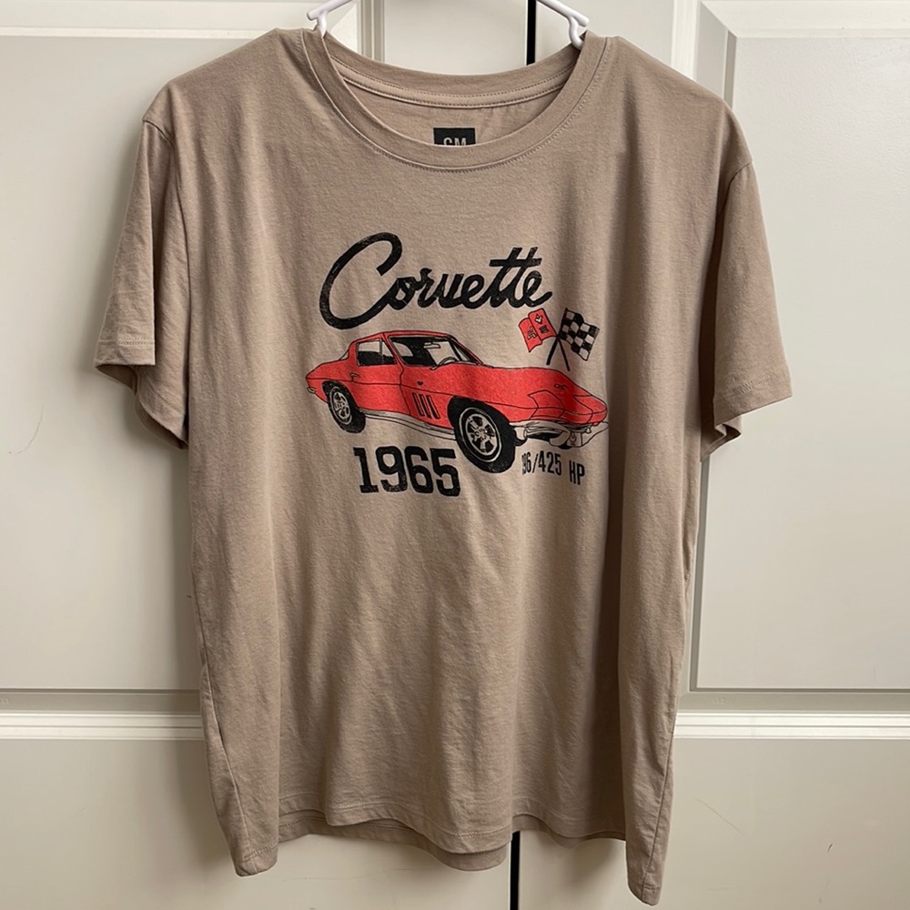 This is a t-shirt with a 1965 corvette on the front.